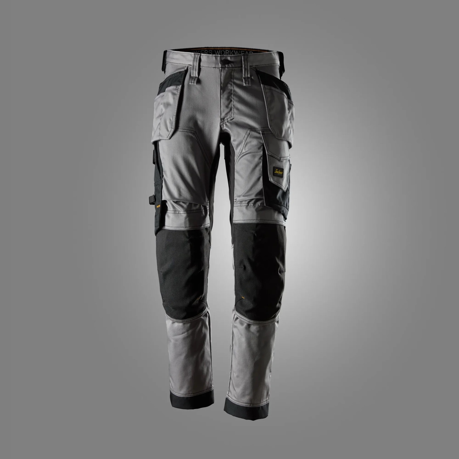 Pantalon Snickers AllroundWork 6241 gris avec sa poche holster noire sur la cuisse