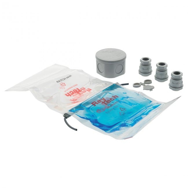 Kit Magic Box 65 Raytech : boîte cylindrique grise, presse-étoupes et sachet de gel bleu
