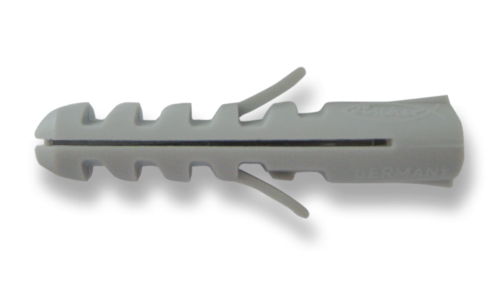 Cheville de type S en polyamide gris posée à côté d’une vis