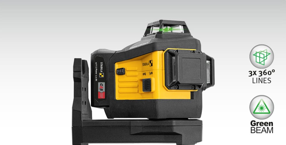 Laser multiligne STABILA LAX 600 G à lignes vertes, posé sur son support