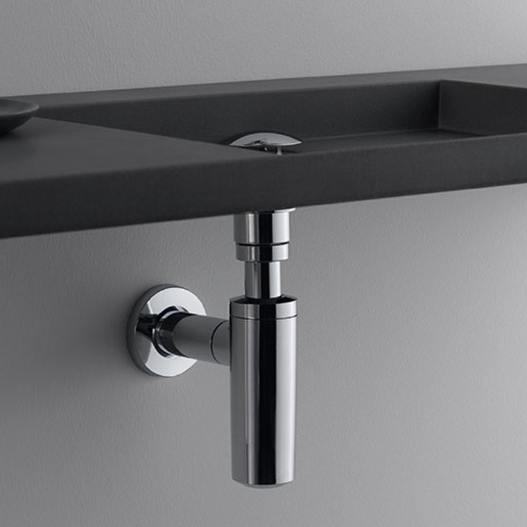 Lavabo gris avec un siphon bouteille chromé visible sous la cuve