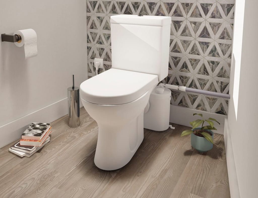 Broyeur WC équipé dans une salle d’eau, illustration de l’article d’entretien SFA