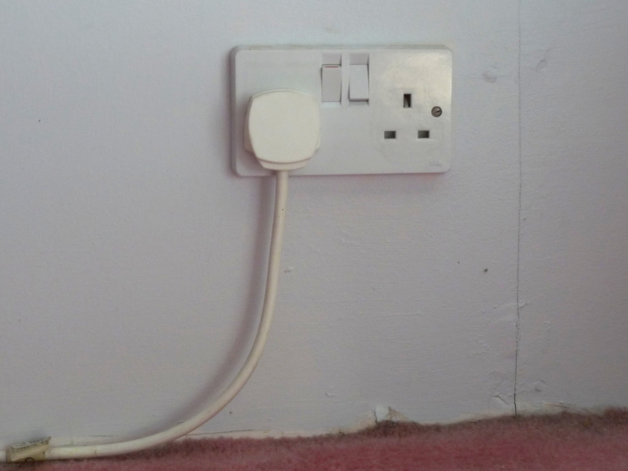 UK BS 1363 twin wall socket with individual switches and safety shutter apertures