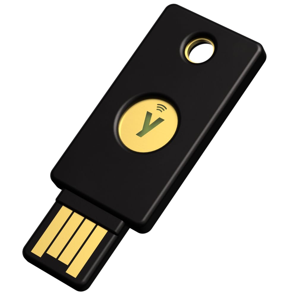 Clé de sécurité USB noire avec un connecteur doré et un bouton central doré marqué d’un Y et d’un symbole d’onde.
